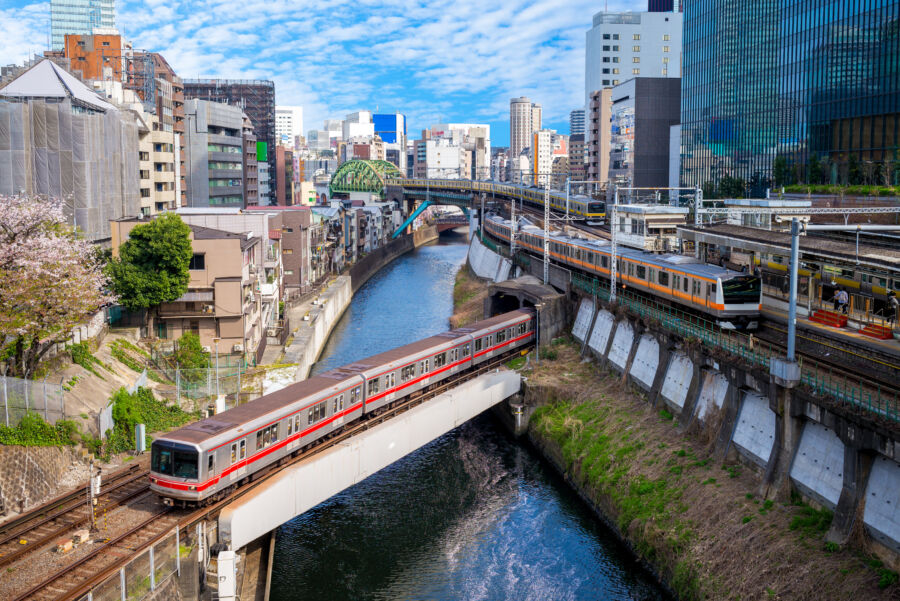 Tokyo metro system, featuring a complex network of trains and stations, serves the vibrant urban landscape of Japan's capital