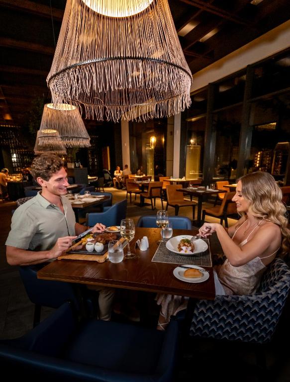 Couple dining at a resto inside Lopesan resort