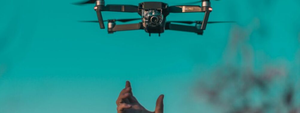 Flying a drone with hand extended