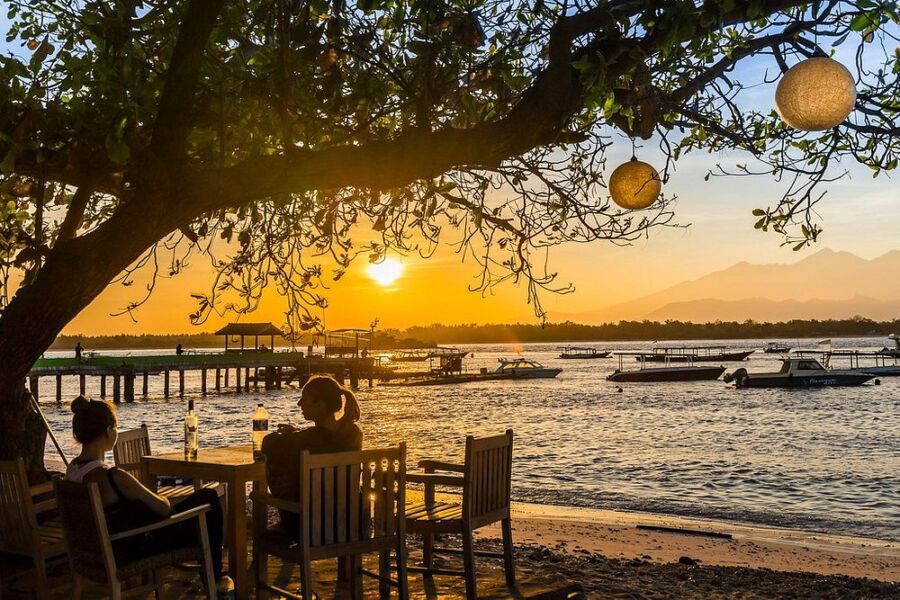 Tourists enjoying the sunset view in Gili Trawangan