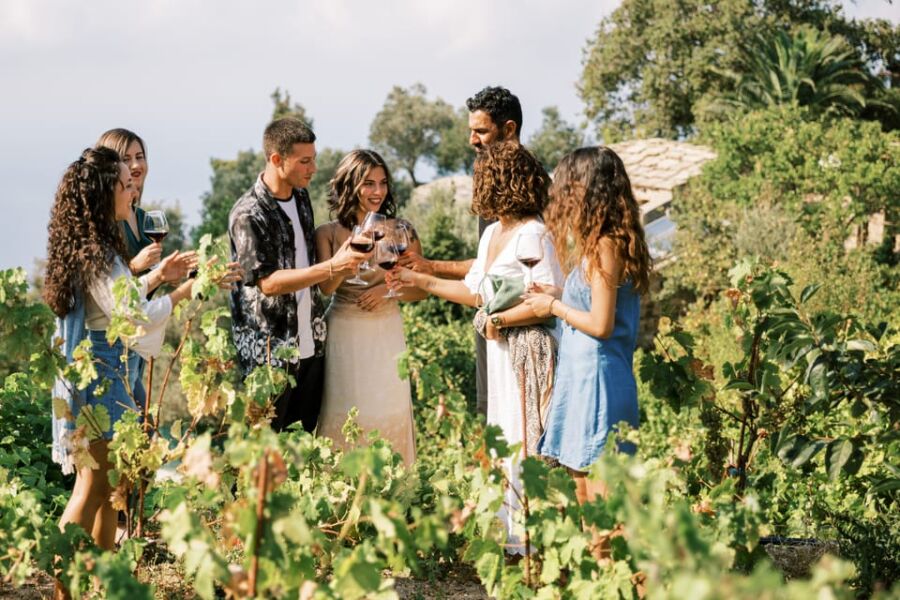 Guests having wine at Ikaria (Greece) tour