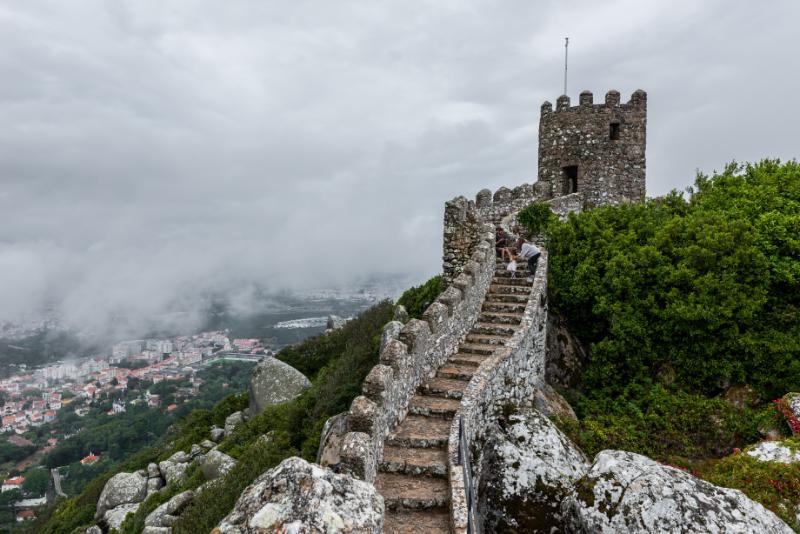 The historic castle of the Moors in Sintra, Portugal on a foggy day