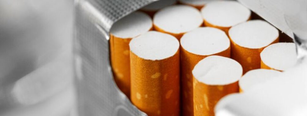 Opened new pack of cigarettes close up