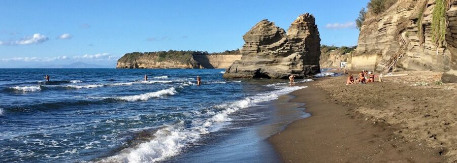 Procida island with few beachgoers