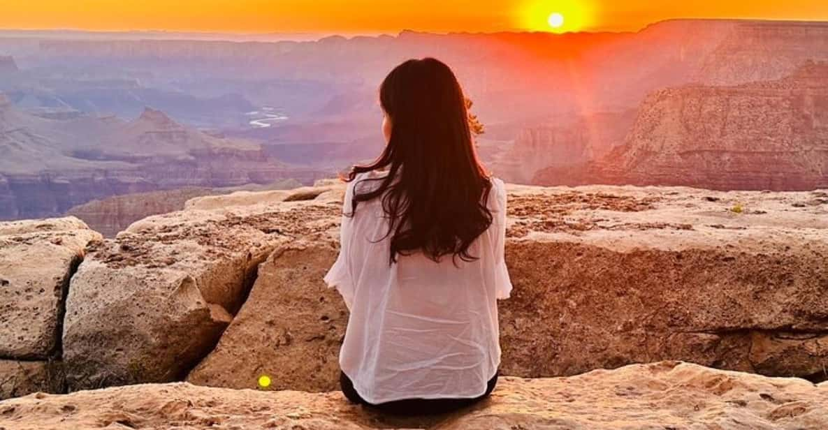 Woman enjoying sunset at South Rim