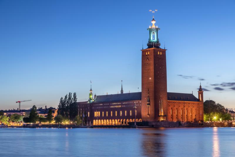 Stockholm City Hall at dusk and lighted