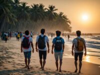 Backpacking students stroll around Coxs Bazar beach