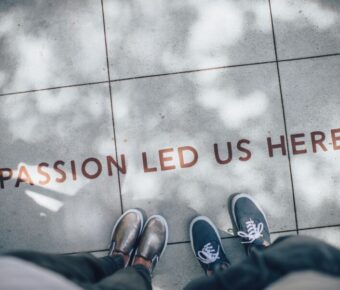 Travelers taking a shot of the ground with text