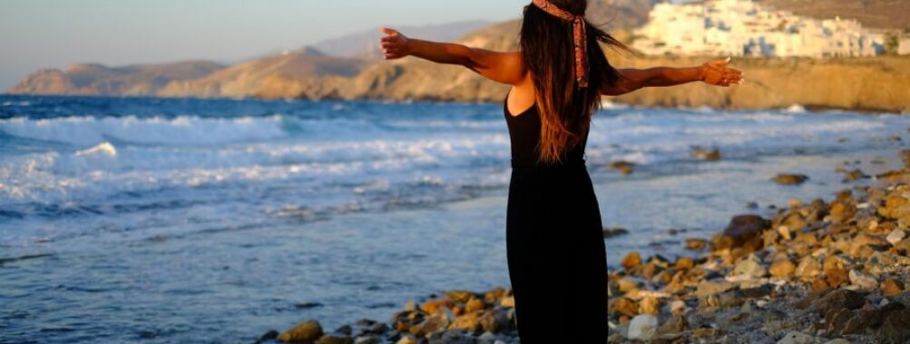 Woman in black enjoying the scenery in Naxos, Greece