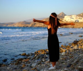 Woman in black enjoying the scenery in Naxos, Greece