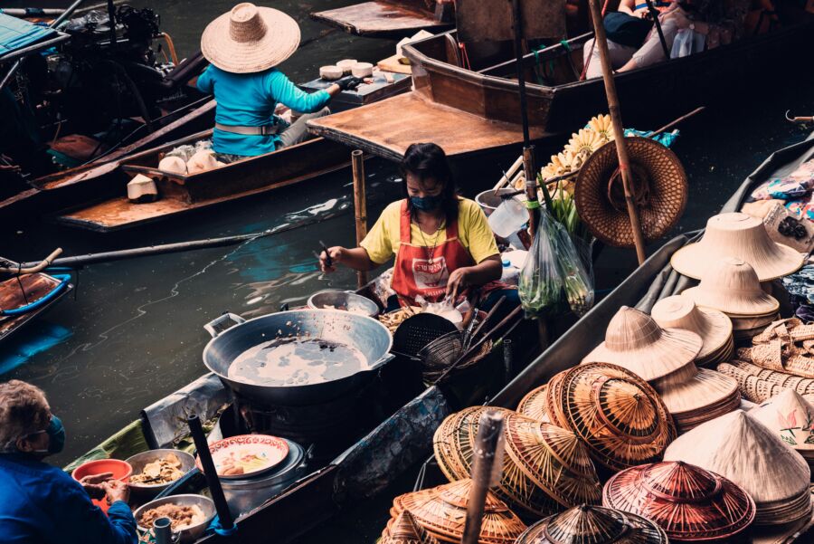 Woman selling on a boat