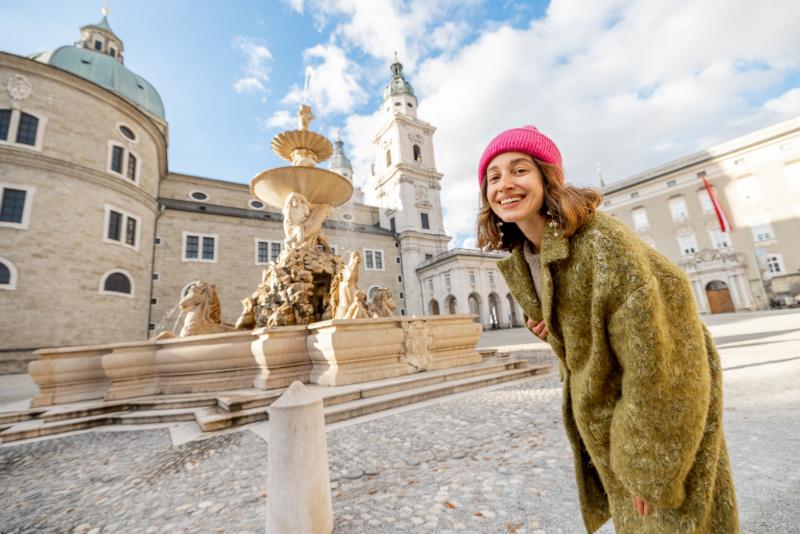 Woman visiting old town in Salzburg