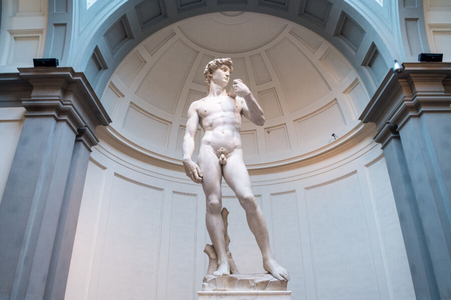 Sculpture of Michelangelo's David displayed in the Accademia Gallery, showcasing Renaissance artistry in Florence, Italy