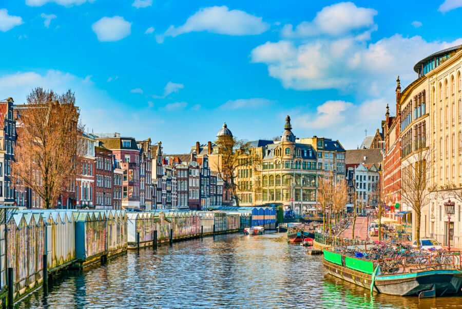 The breathtaking skyline of Amsterdam in early spring, highlighting its fabulous buildings and vibrant atmosphere