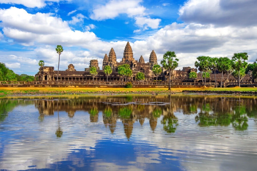 Panoramic view of Angkor Wat Temple in Siem Reap, Cambodia, showcasing its majestic architecture and surrounding landscape