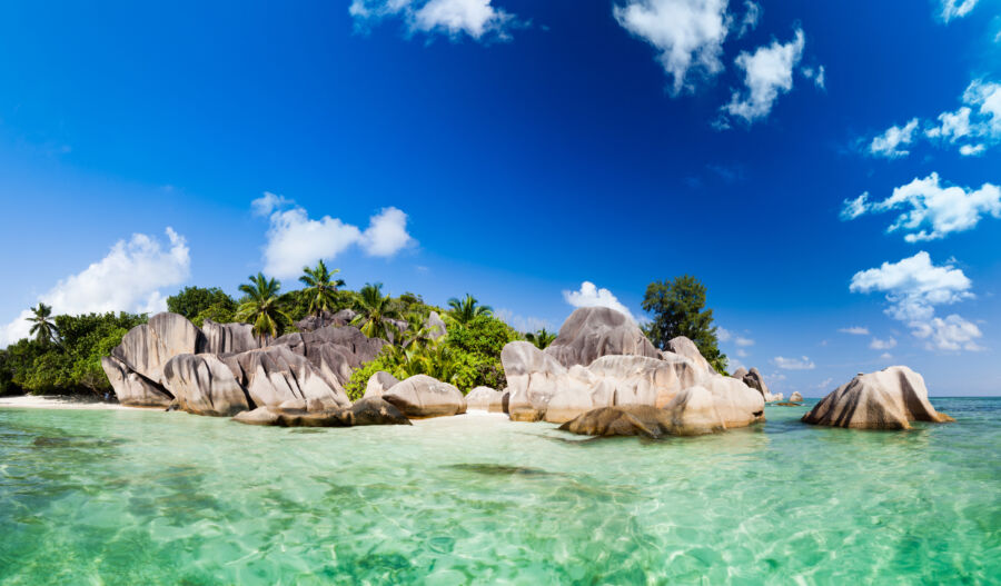 Scenic view of Anse Source d'Argent beach on La Digue, Seychelles, featuring clear waters and a stunning skyline