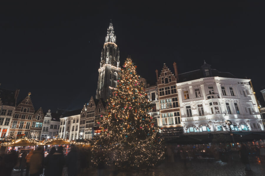 Christmas lights adorn Antwerp Cathedral, highlighting the festive atmosphere of the December Christmas market in Belgium