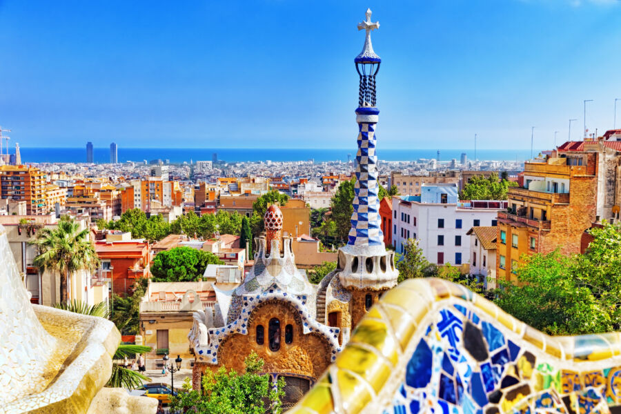 Stunning view of Park Güell in Barcelona, showcasing its vibrant mosaics and unique architectural features