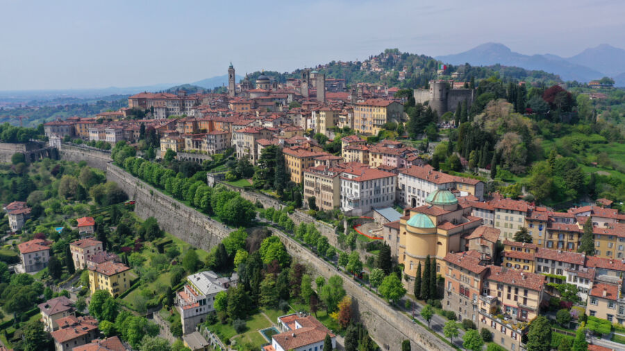 Aerial view of the historic fortified upper Medieval city of Bergamo, showcasing its iconic architecture in Lombardy, Italy