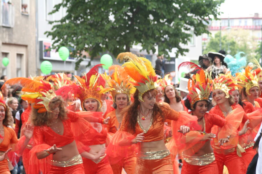 Festive atmosphere at the Berlin Carnival of Cultures  (karneval der kulturen ) featuring lively parades and cultural displays throughout the city