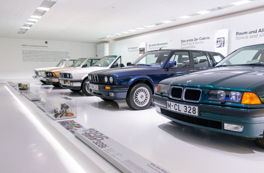 Close-up of a vintage BMW automobile exhibit at the BMW Museum in Munich, Germany, showcasing intricate design details