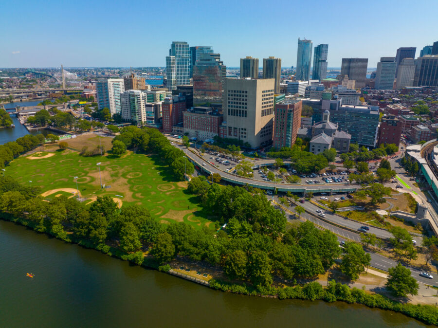 Aerial perspective of Boston, highlighting Massachusetts General Hospital and the West End skyline against the city backdrop