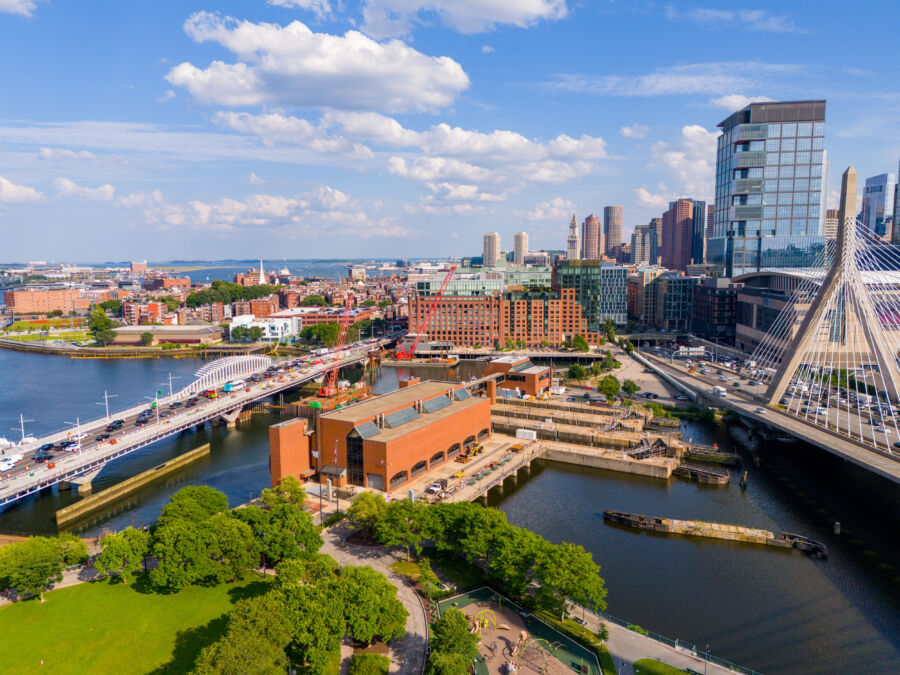 The Boston skyline features prominent skyscrapers and historic architecture