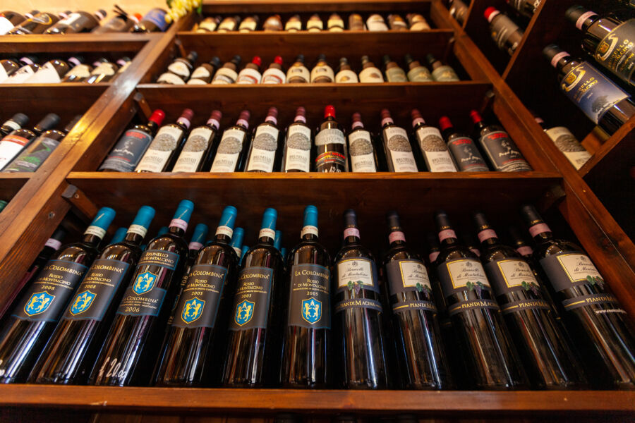 Brunello di Montalcino wine bottles and interior of a wine shop in Montalcino ,Tuscany, Italy