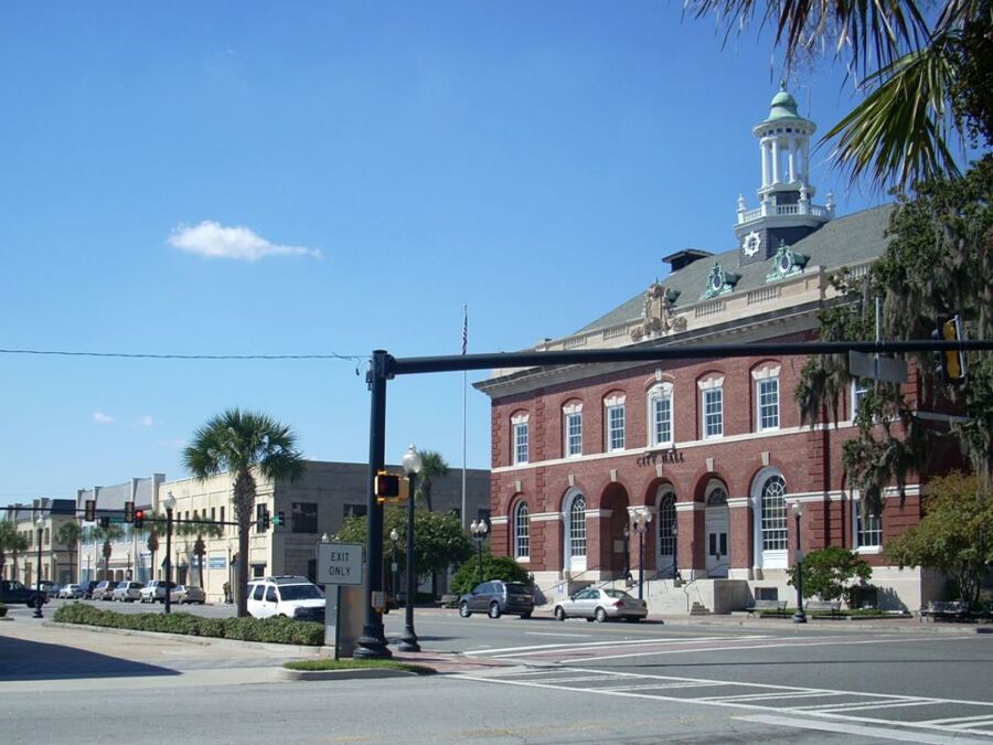 Panoramic view of Downtown Brunswick, Georgia, showcasing historic buildings and vibrant streets under a clear blue sky