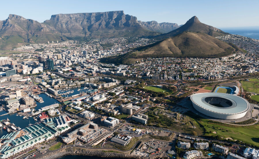 Stunning view of Cape Town's cityscape with Table Mountain in the background, showcasing South Africa's natural beauty