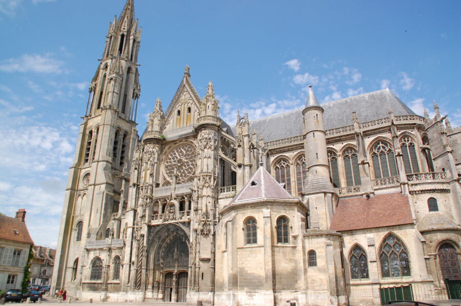 Stunning view of Cathédrale Notre-Dame de Senlis, showcasing its intricate facade against a beautiful skyline