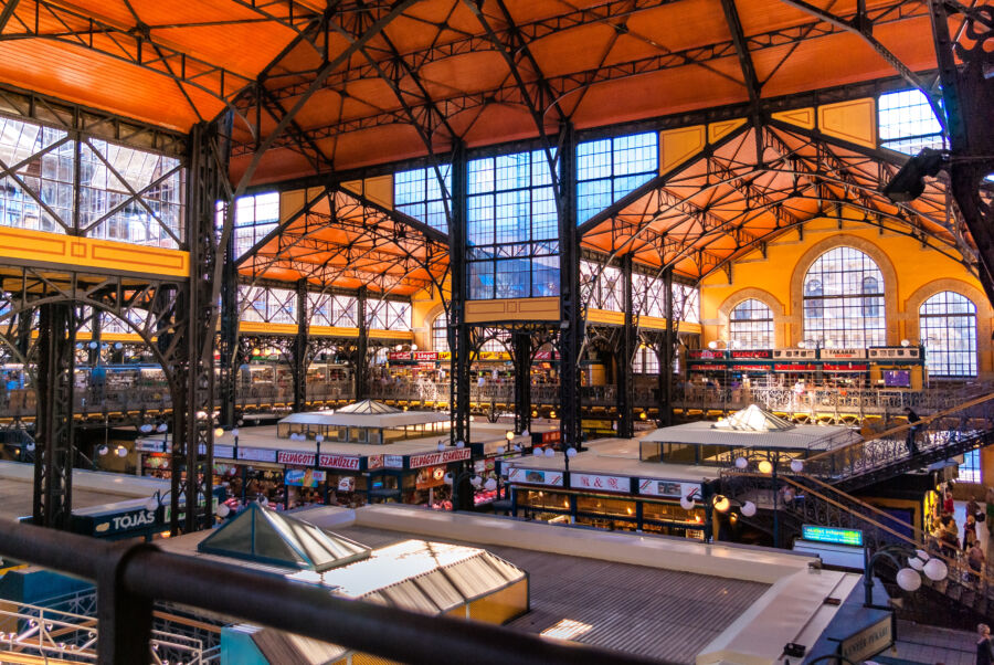 The Central Hall Market in Budapest, displaying an interior filled with diverse stalls and a dynamic atmosphere of shoppers