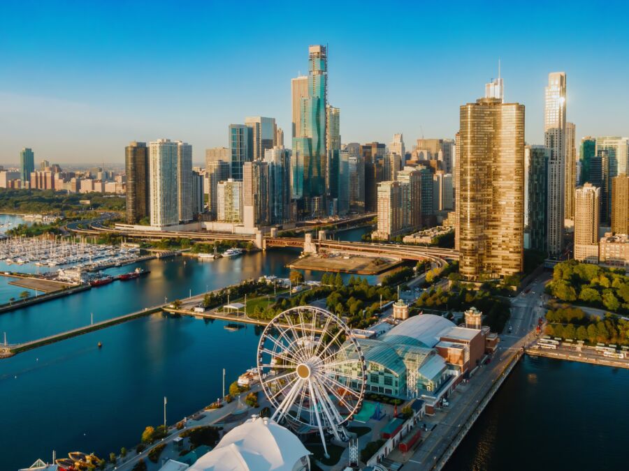 Chicago skyline at dawn, showcasing architectural beauty and the harbor, with Navy Pier