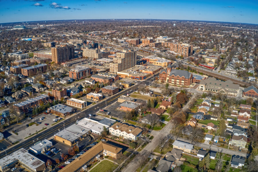 Aerial view of Arlington Heights suburb in Chicago, showcasing vibrant autumn foliage and suburban landscapes