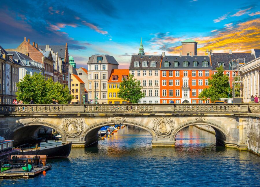 Sunset illuminates Copenhagen's architecture, reflecting the charm of Stockholm and the European Union's cultural heritage