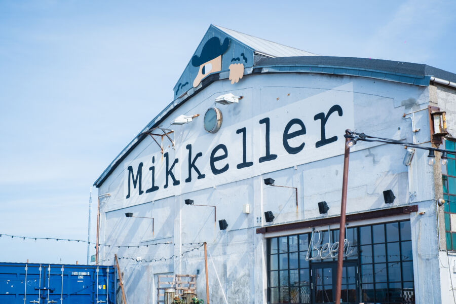 Mikkeller beer bar in Reffen, Copenhagen, showcasing a variety of craft beers from the renowned Mikkeller brewery