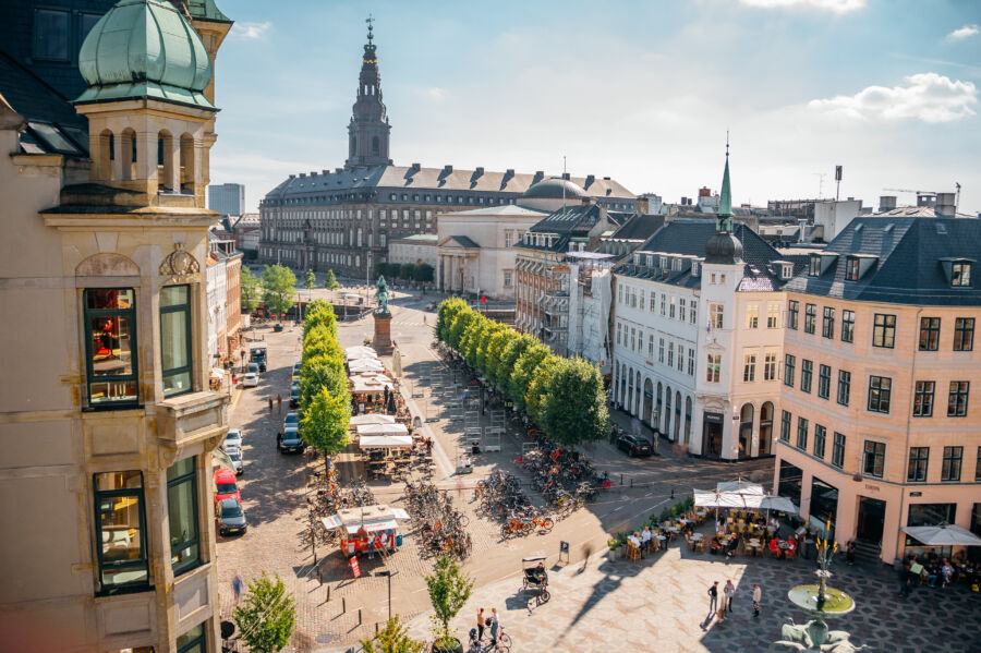 Aerial view of Stroget, Copenhagen's renowned shopping district bustling with visitors and vibrant storefronts.