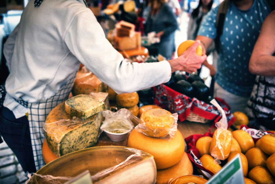 Assortment of Dutch cheeses arranged at a farmers' market