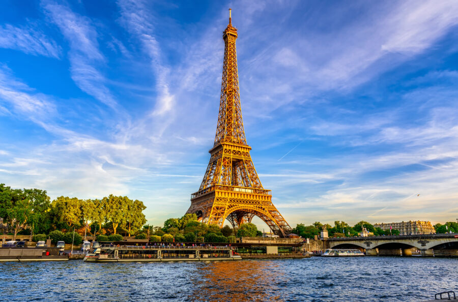 Paris Eiffel Tower and river Seine at sunset in Paris, France. E