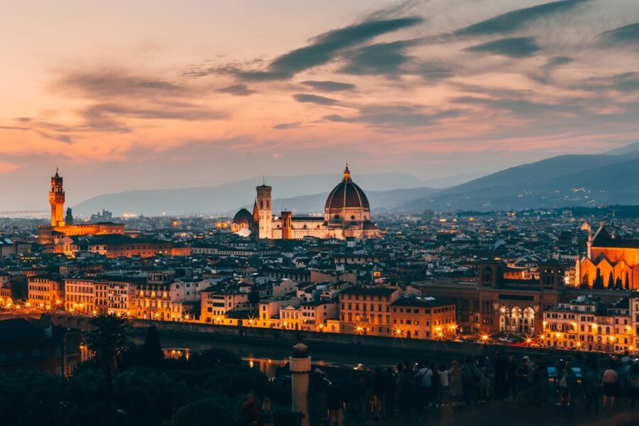 Florence panoramic view at twilight showcasing historic architecture and vibrant sunset colors.