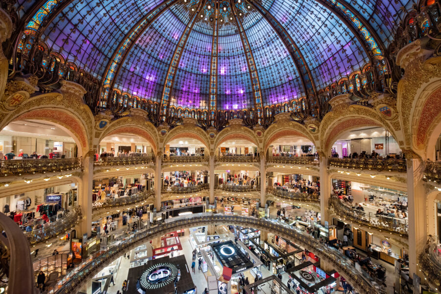 The magnificent dome of Galeries Lafayette, a luxury department store in Paris, highlighting its elegant design and grandeur