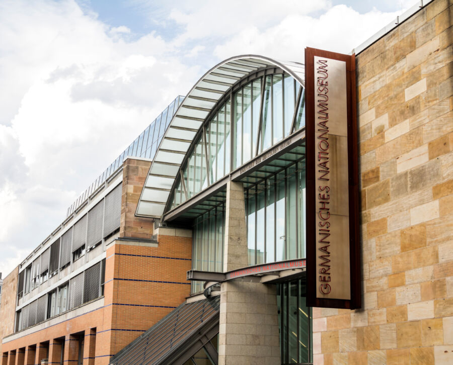 The entrance of the German National Museum in Nuremberg, showcasing its architectural design and welcoming atmosphere