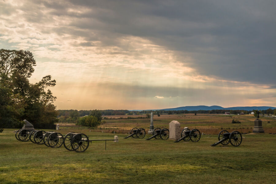 Panoramic view of the Gettysburg battlefield in Pennsylvania, showcasing rolling hills and historical monuments