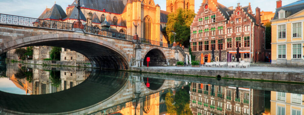 Medieval cathedral and bridge over a canal in Ghent - Gent, Belgium