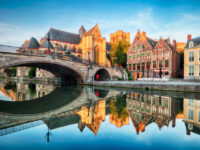 Medieval cathedral and bridge over a canal in Ghent - Gent, Belgium