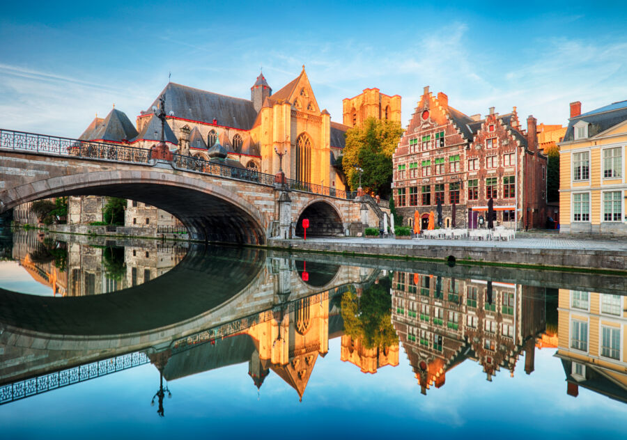 Medieval cathedral and bridge over a canal in Ghent - Gent, Belgium