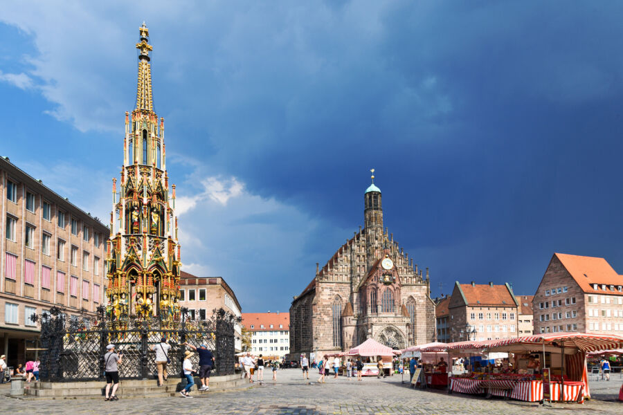 The iconic Frauenkirche stands in Nuremberg's medieval center, a testament to Gothic architecture in Hauptmarkt, Germany