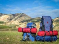 Hiking backpacks with mountains backdrop