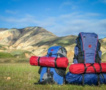 Hiking backpacks with mountains backdrop