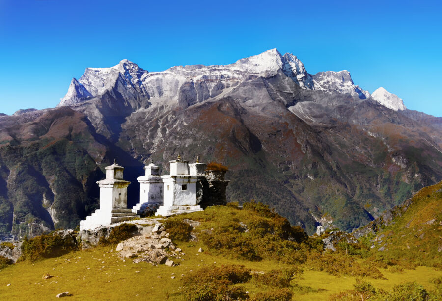 Majestic view of the Himalayas in Nepal, showcasing towering peaks and serene landscapes under a clear blue sky